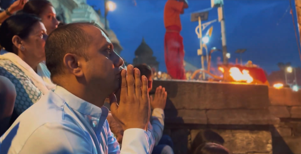 a-devotee-during-pashupatinath-aarati-scaled