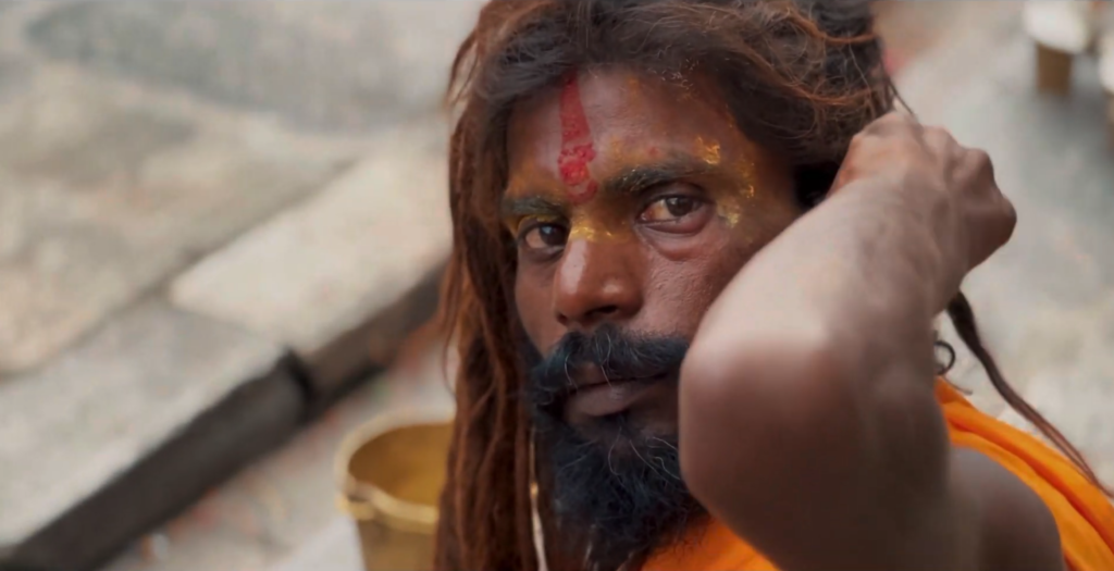a-sadhu-at-pashupatinath-temple-close-up-shot-scaled